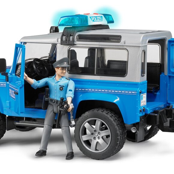 NIB Bruder Toys 02597 Land Rover Police Vehicle w/ Light Skin Policeman - Picture 1 of 4